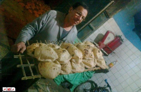تطبيق منظومة الخبز الجديدة في مركز الشهداء محافظة المنوفية Crop,488x320,mixmedia-03161653Mf0T1